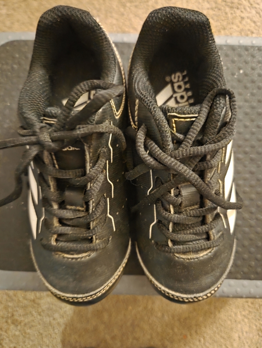adidas Black Sneakers with White Stripes and Gold Accents